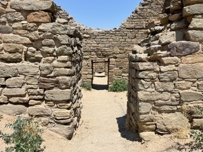 Corridor leading through series of walls at Aztec Ruins National Monument in Aztec New Mexico