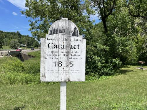 Photo of sign advertising Cataract Wisconsin and local Indigneous tribes who historically inhabited the region